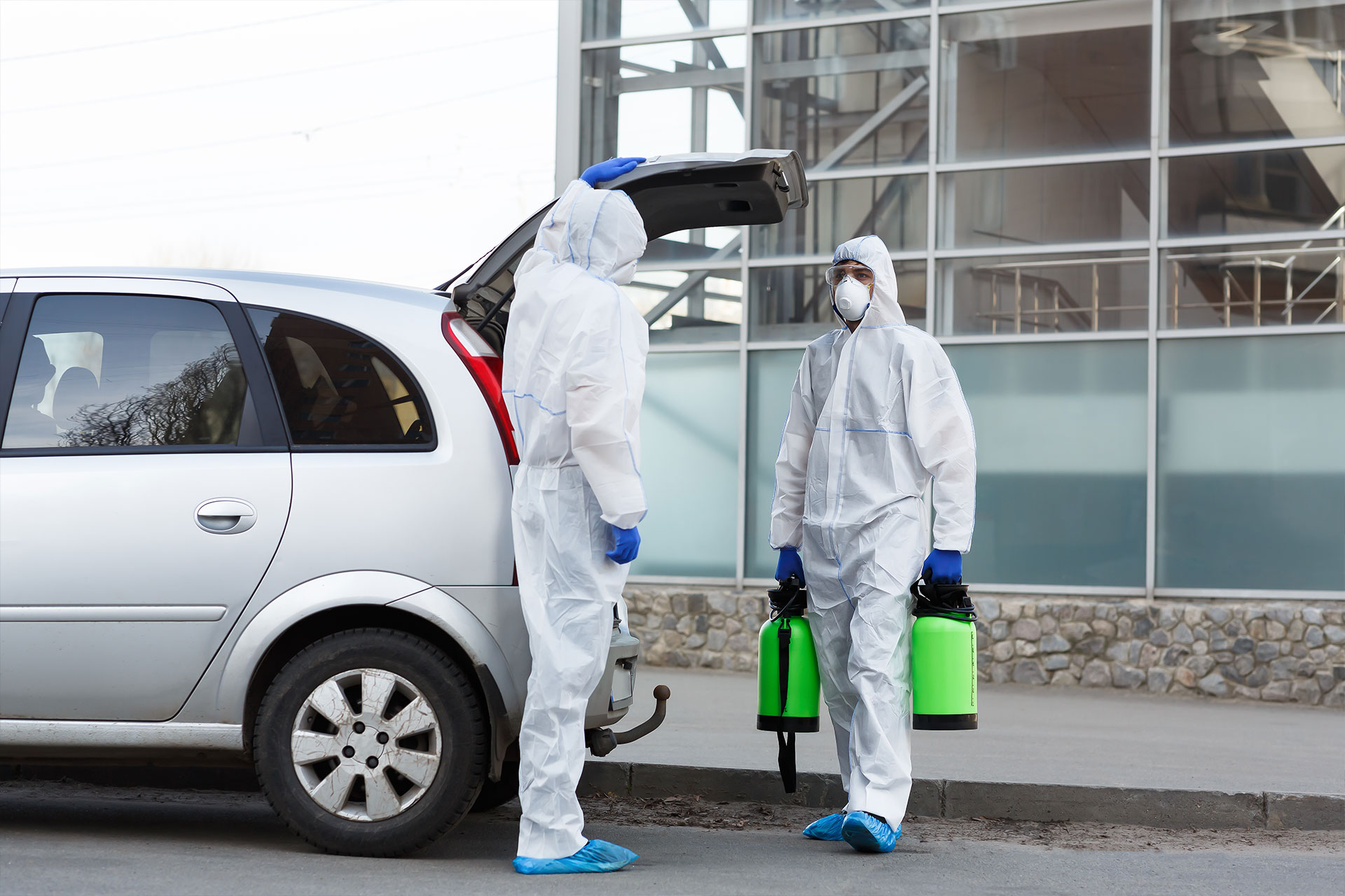 man-in-hazmat-suits-buying-disinfection-spray-for-2021-08-27-18-01-25-2DG27ZY (1)